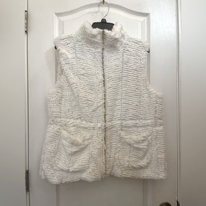 White furry vest